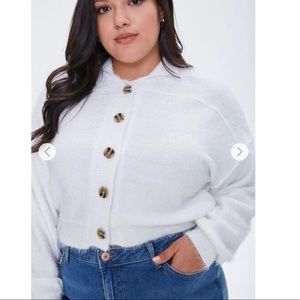 white sweater